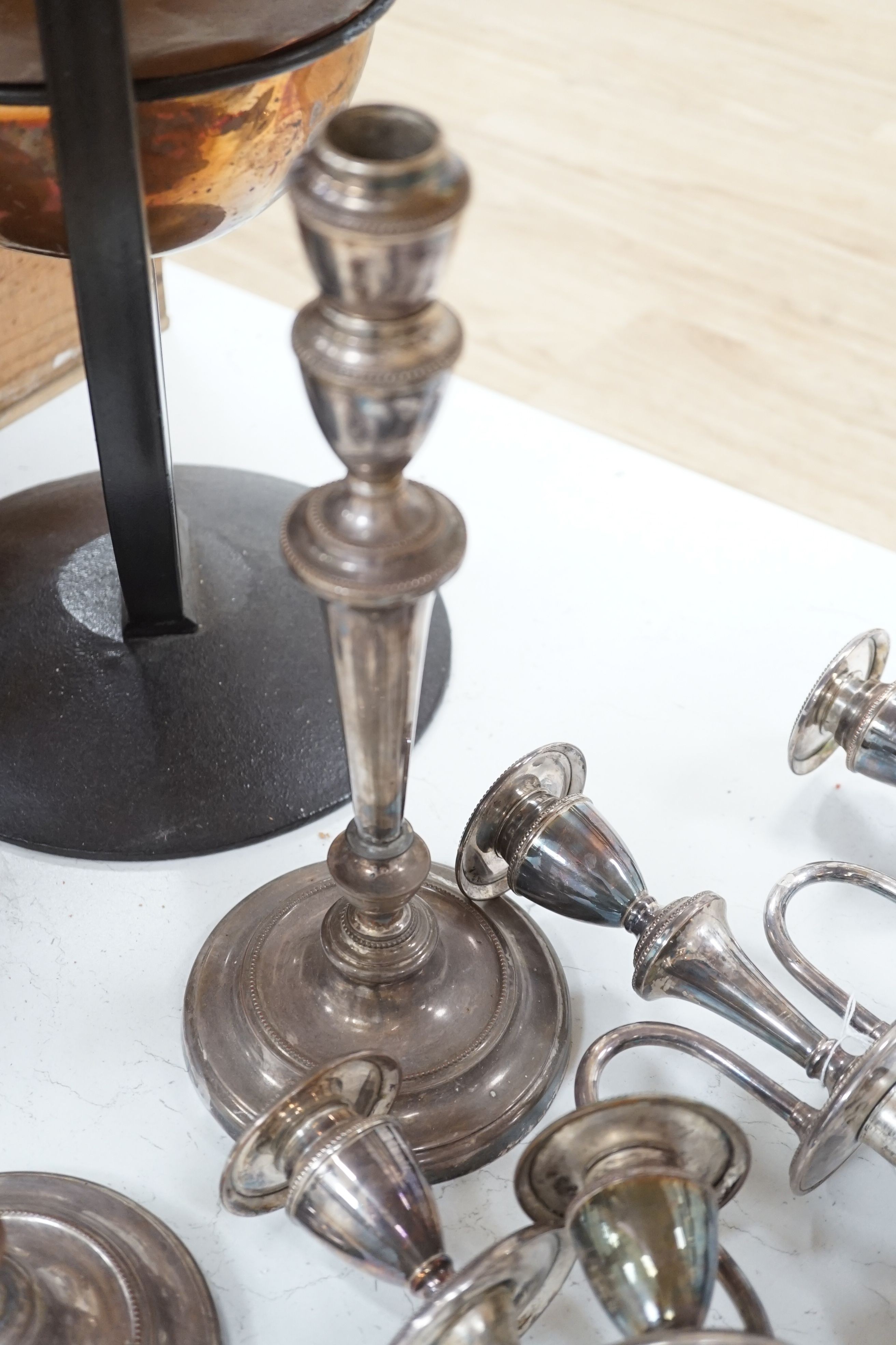 A pair of plated two branch, three light candelabra (1 a.f)